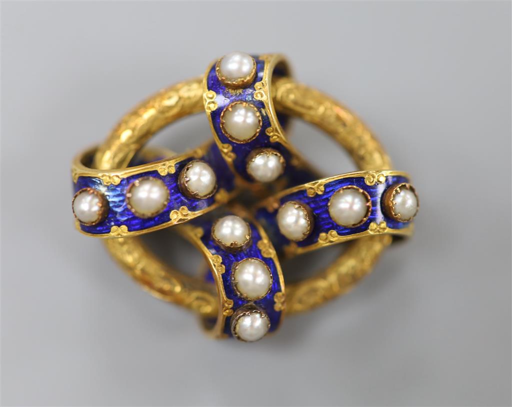 A Victorian yellow metal, blue enamel and split pearl set interwoven oval brooch, 35mm, gross 14 grams.